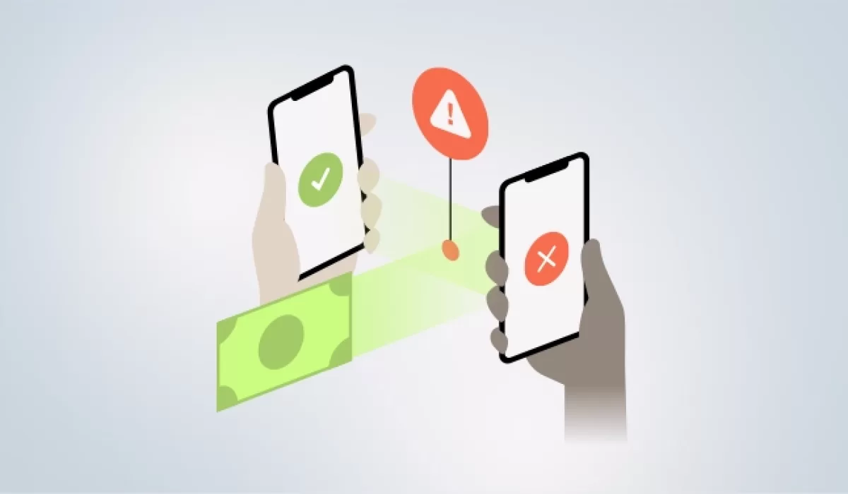 Illustration of a digital transaction between two smartphones—one with a green check mark and the other with a red X. A red warning sign with an exclamation mark appears between the devices, indicating a failed or fraudulent money transfer.